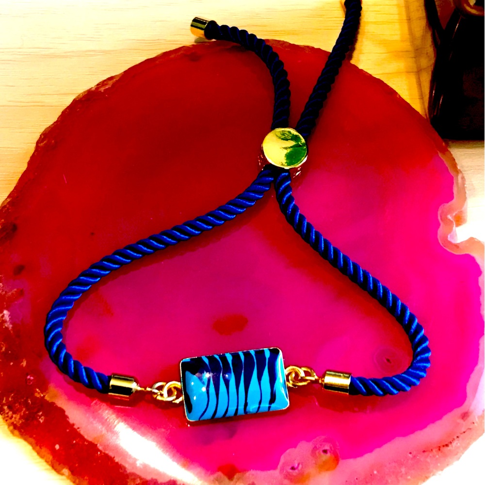 One-of-a-kind hand made adjustable blue Enamel bracelet.